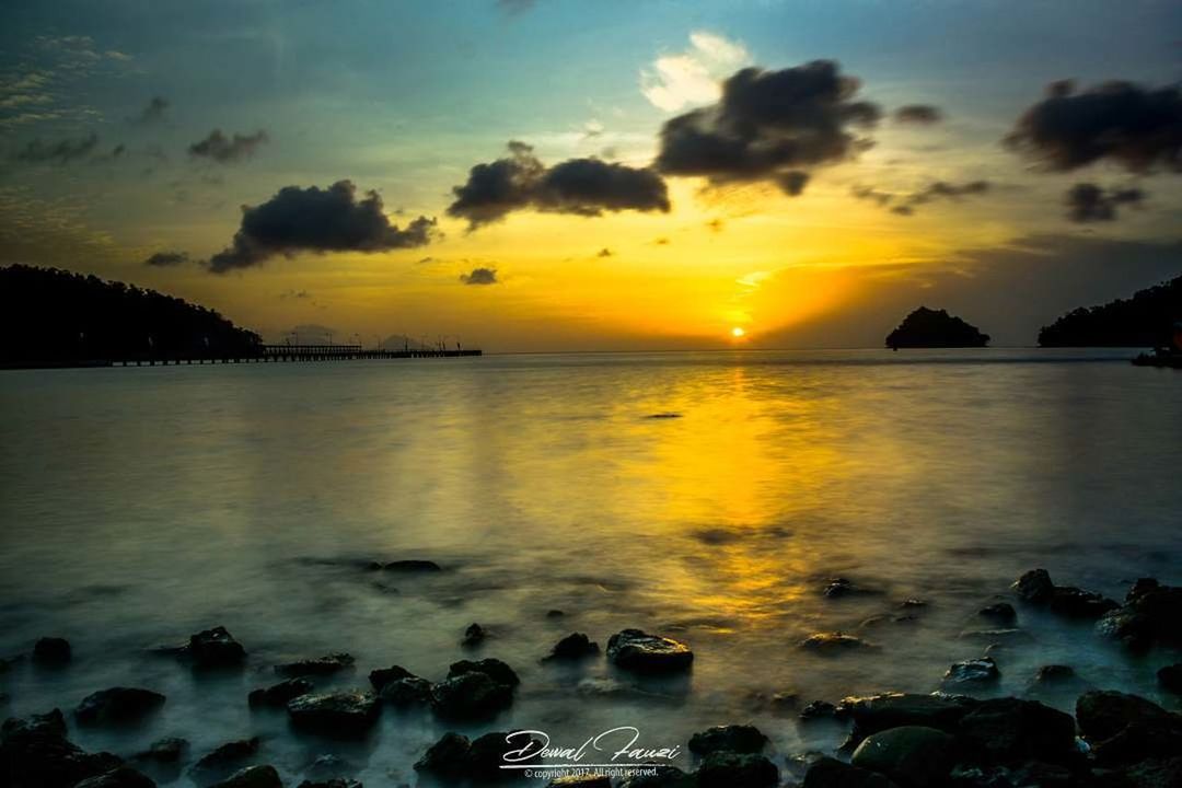 SCENIC VIEW OF SEA DURING SUNSET