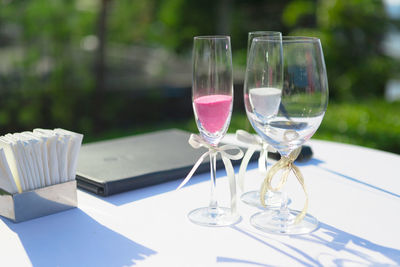 Glass of wine glasses on table