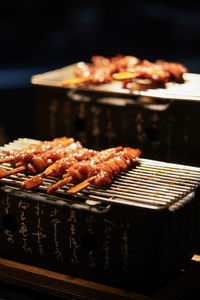 Close-up of meat on barbecue grill