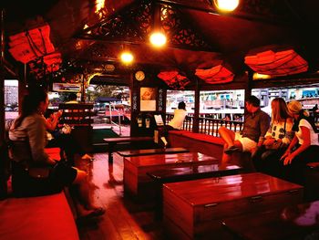 Group of people in market at night