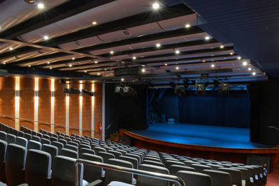 Interior of illuminated stage at night