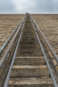 Railroad tracks against sky