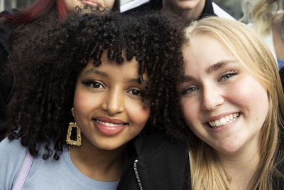 Portrait of smiling female friends together