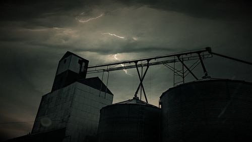 Low angle view of storm clouds at night