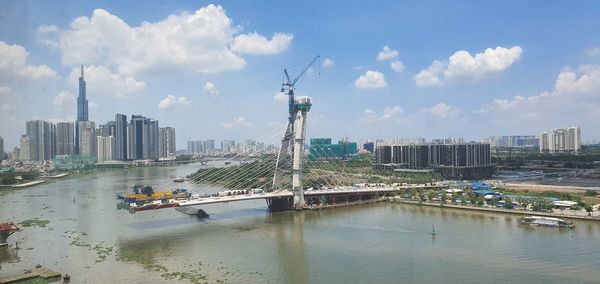 Panoramic view of city buildings against sky