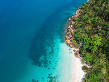 High angle view of bay against clear blue sky