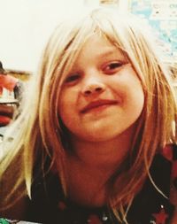 Close-up portrait of a smiling girl