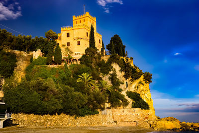 Low angle view of historical building against sky