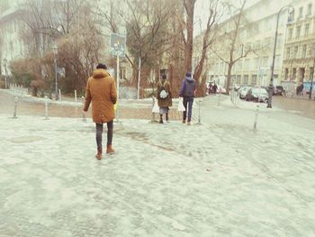 Full length of woman standing in park