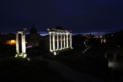 Illuminated buildings in city at night