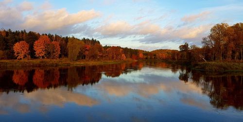 Reflection of trees in lake against sky during autumn