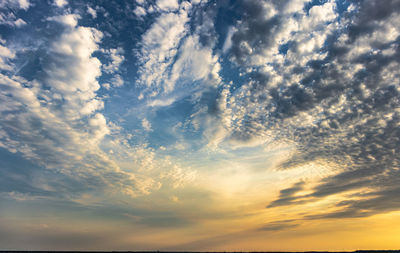 Low angle view of dramatic sky during sunset