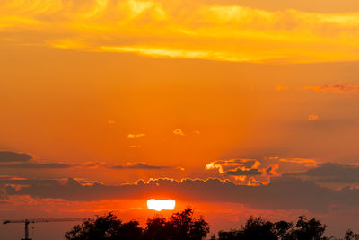 Scenic view of dramatic sky during sunset