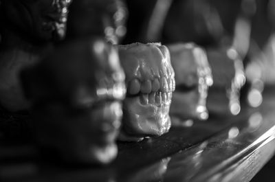 Close-up of dentures on shelf