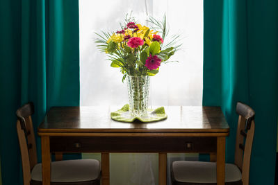 Potted plant on table at home