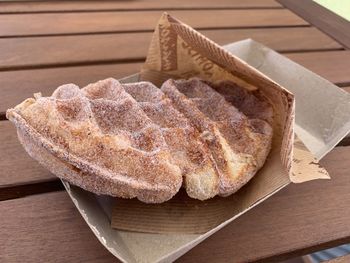 High angle view of bread on cutting board