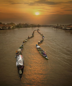 High angle view of river against sky during sunset