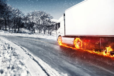 Car on road against sky during winter