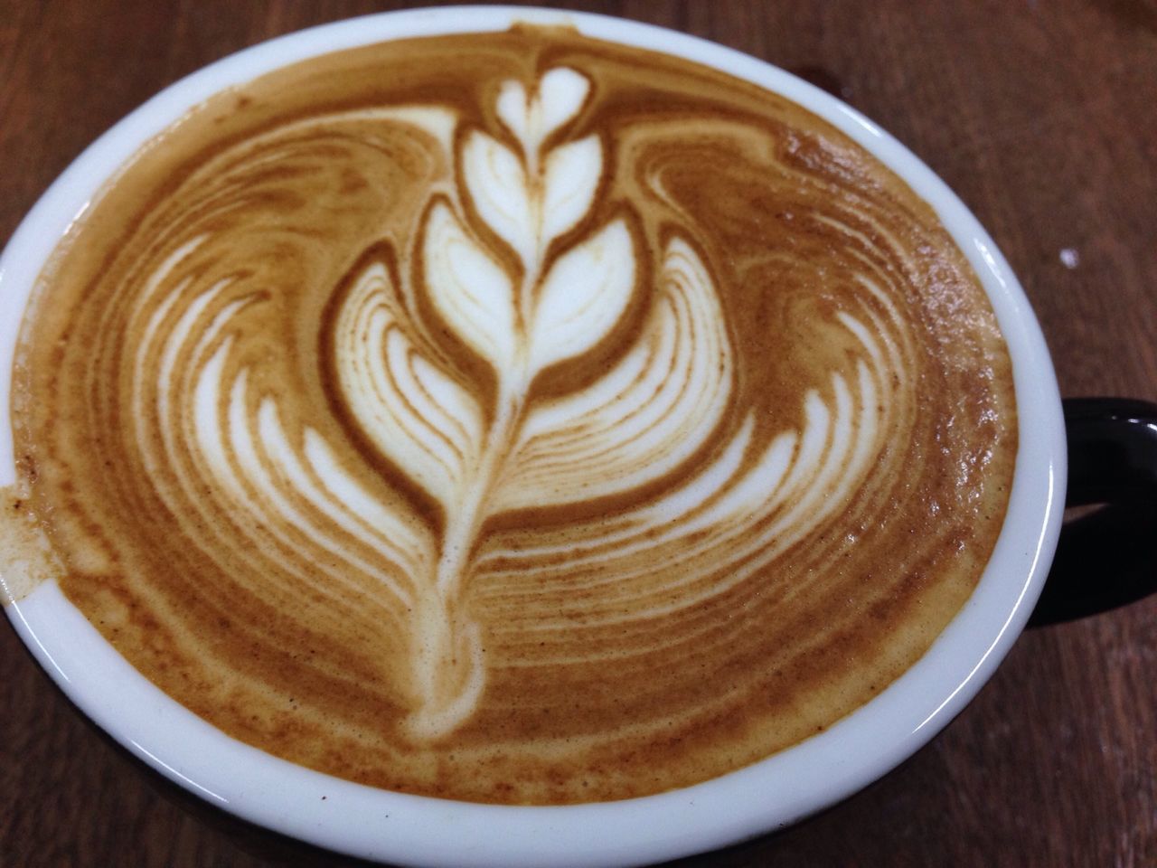 drink, food and drink, refreshment, coffee cup, frothy drink, froth art, coffee - drink, cappuccino, saucer, indoors, freshness, table, coffee, still life, latte, close-up, high angle view, directly above, design, pattern