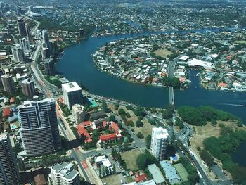 High angle view of river amidst buildings in city