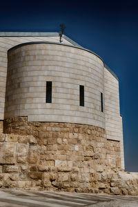 Low angle view of old building against clear sky