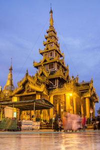 Low angle view of illuminated temple building against sky