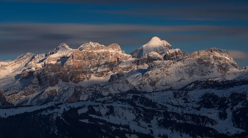 Snow covered mountain against sky