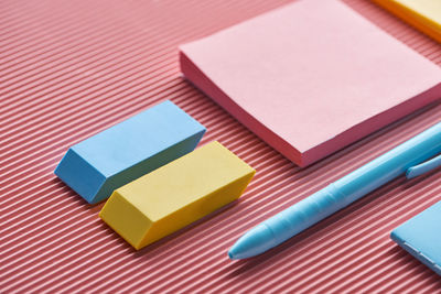 High angle view of colorful papers on table