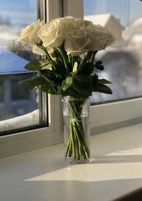 Flowers in vase on table