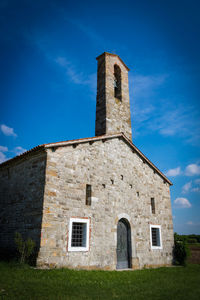 Low angle view of historic building against sky