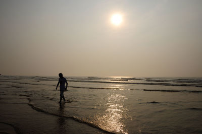 Scenic view of sea at sunset