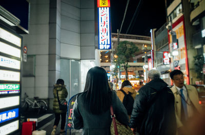 Woman standing in city