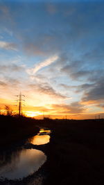 Scenic view of dramatic sky during sunset