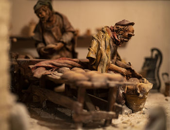 Close-up of statue on table