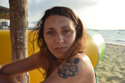 Portrait of beautiful woman at beach