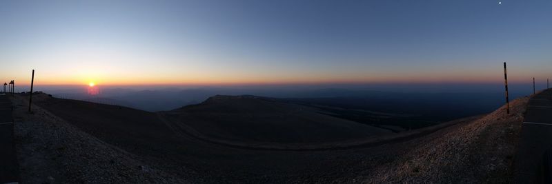 Scenic view of landscape against sky during sunset