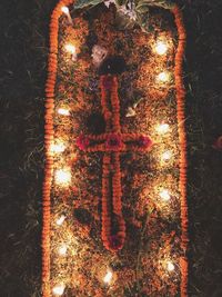 Close-up of illuminated christmas lights at night