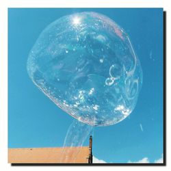 Bubbles against blue sky