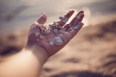 Close-up of woman holding hands