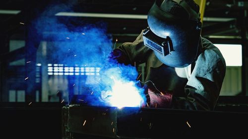 Man welding at factory