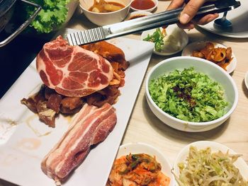 High angle view of food served on table showing pork line in bonus party salaryman on saturday 