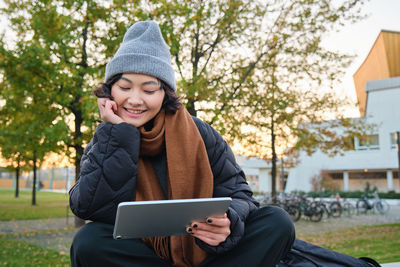 Young woman using mobile phone