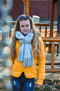 Portrait of smiling woman standing outdoors