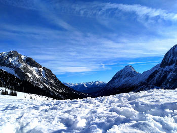 Snowcapped mountains against sky