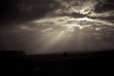 Scenic view of silhouette landscape against sky during sunset