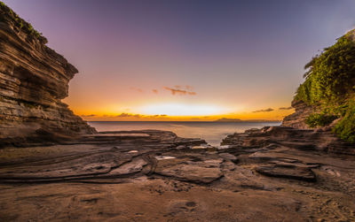 Scenic view of sea against sky during sunset