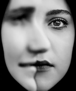 Close-up portrait of young woman