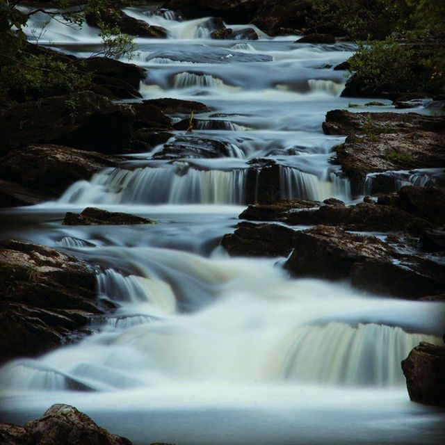 waterfall, motion, water, flowing water, long exposure, flowing, rock - object, beauty in nature, scenics, blurred motion, nature, forest, power in nature, stream, splashing, surf, rock formation, idyllic, environment, rock