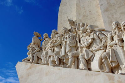 Low angle view of statue against sky