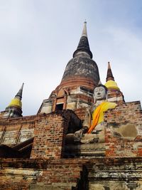 Low angle view of temple building against sky